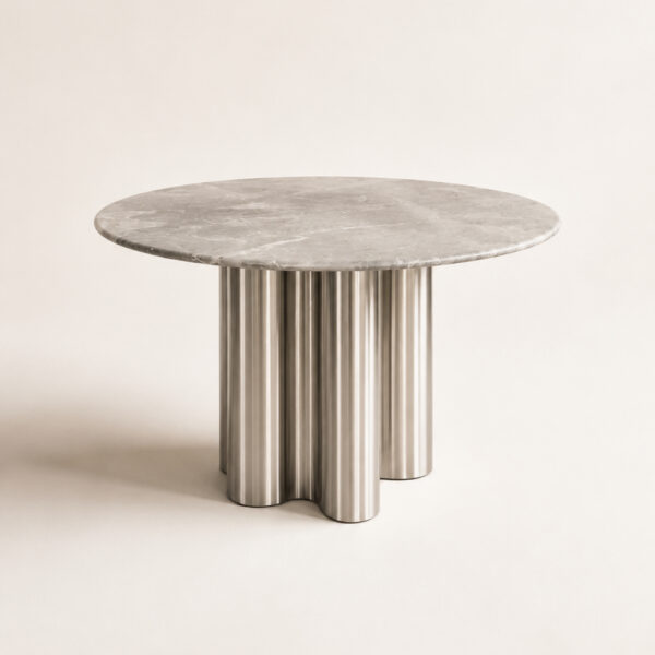 Modern round marble dining table with premium marble tabletop and stainless steel cylindrical pedestal base for contemporary dining rooms.