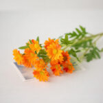 Artificial Daisy Flower Spray with realistic faux blooms and green foliage for home décor