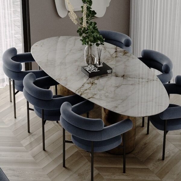 Odessa marble oval dining table, top-down view styled with dried branch centerpiece
