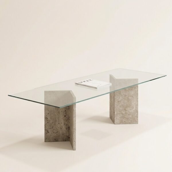 Vitra glass dining table with raw travertine legs, angled view