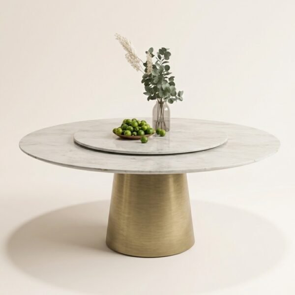 Marbella round marble dining table with brushed brass pedestal base, front angle view