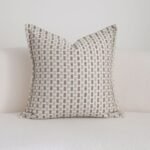 Tessera cushion flanged edge detail