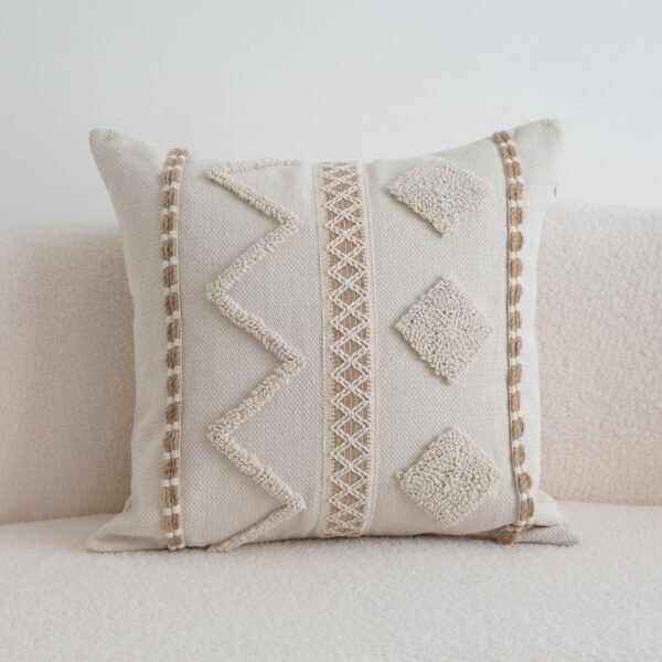 Woven lattice centre band and braided trim detail on Atlas cushion
