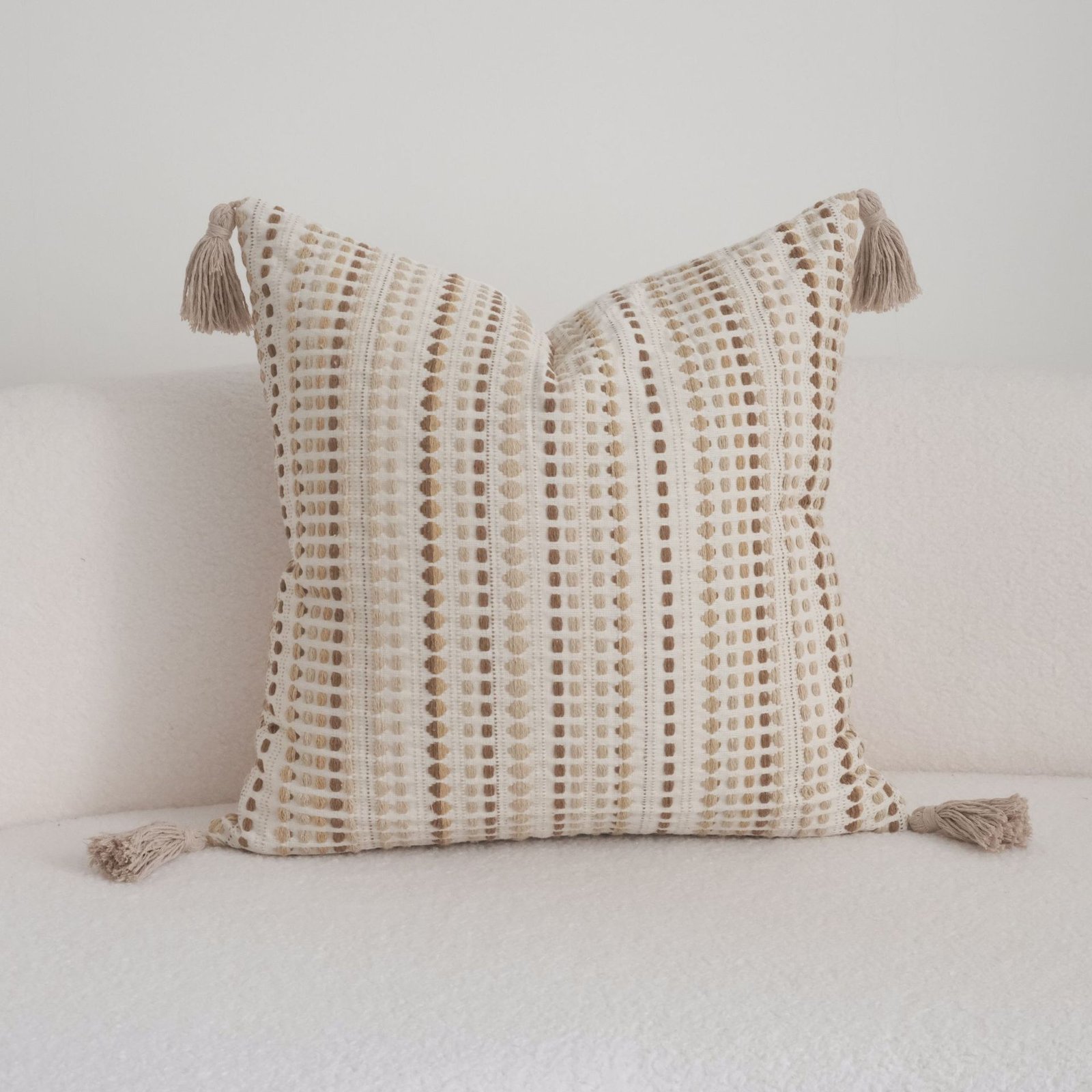 pillow 15 Close-up of raised sand and camel dotted stitches on Dune cushion