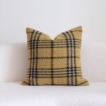 Harlow mustard plaid woven cushion on cream boucle sofa
